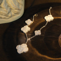 [Blue Jewels] Kleeblatt-Armband mit 5 Motiven, silberfarben und mit Diamanten besetzt